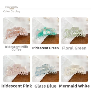Detailed color display of oversized acetate hair claws in various iridescent finishes