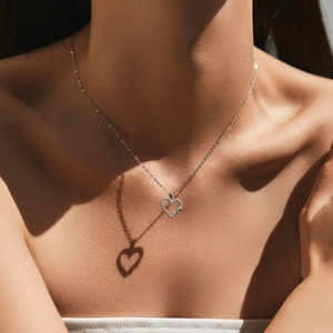 S925 sterling silver heart necklace with infinity symbol and pavé cubic zirconia