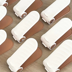 Detail of adjustable double-layer shoe rack with anti-slip stripes and cartoon bear motif