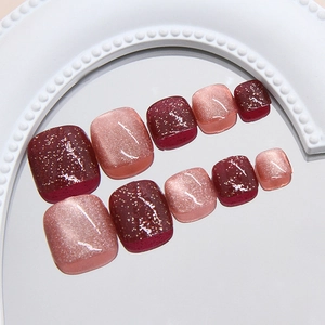 Lot de 24 faux ongles de pieds rouge foncé pailleté et effet œil de chat doré chic