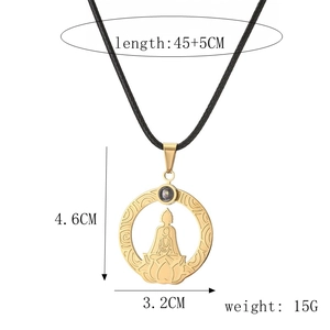 Detailed view of Buddha pendant size dimensions 4.6x3.2cm on a black cord necklace
