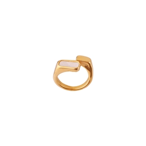 Detailed macro view of 18k gold irregular ring with rectangle white mother of pearl inlay
