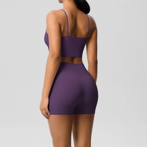 Detail view of the seamless back design and fabric texture of the purple yoga set