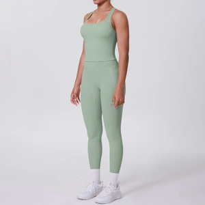 Light green racerback sports bra and leggings yoga set for women with side pockets