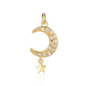 Detail of gold crescent moon pendant with clear zircons and a small hanging star charm
