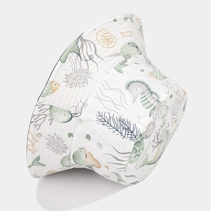 White reversible sun hat for kids featuring cute cartoon sea creature prints in cotton fabric