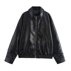 Close-up of black faux leather bomber jacket featuring front zipper and lapel collar details