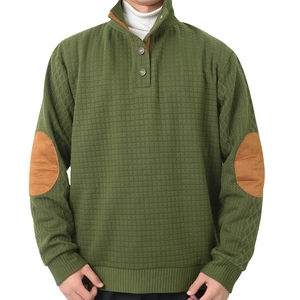 Detail of green quilted waffle texture on men's long sleeve sweatshirt with button collar