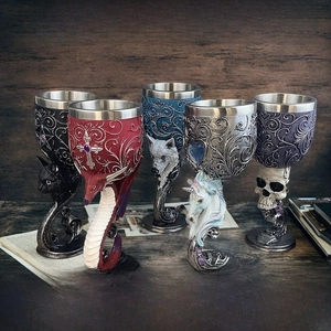 Detailed close-up of fantasy style dragon wine goblets with stainless steel inserts