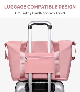 Pink foldable sports fitness travel bag featuring a back trolley sleeve for luggage