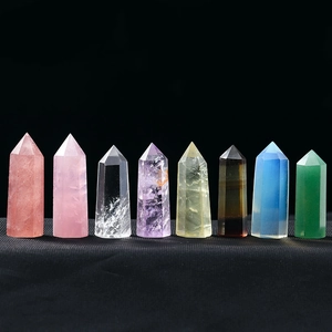 Macro view of polished hexagonal natural crystal prisms in diverse vibrant colors
