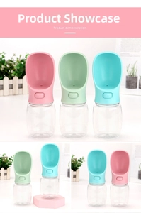 Close-up of portable pet water bottle dispenser in pink green and blue colors