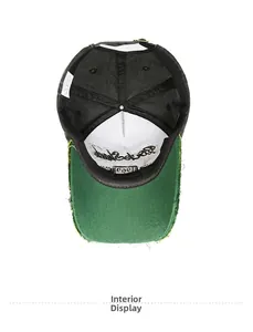 Detail view of cotton baseball cap interior showing stitching and green underbrim