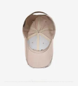Detailed interior view of a vintage distressed baseball cap showing seams and eyelets