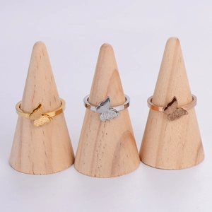 Detailed comparison of double-layer butterfly rings in gold, silver, and rose gold finishes