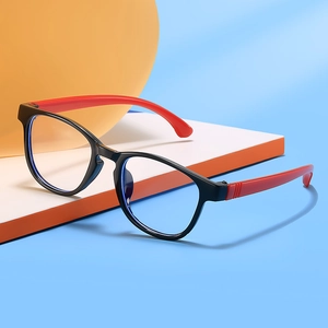 Kids blue light blocking glasses in black and red on a colorful geometric background
