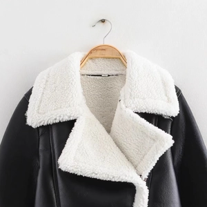 Women's faux leather moto jacket with white faux fur collar and silver zipper detail