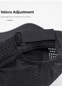 Macro detail of the adjustable velcro strap and breathable mesh on this black sport sun hat