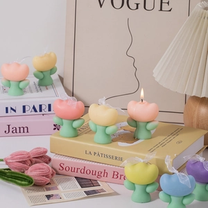 Pastel tulip-shaped scented candles in pink and yellow for home decor and gifts
