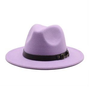 Detailed close-up of lilac wool felt fedora featuring black leather band and gold buckle