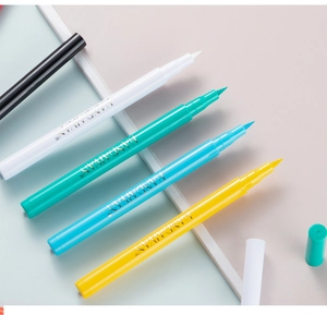 Detailed view of colorful waterproof liquid eyeliners in black white green blue yellow