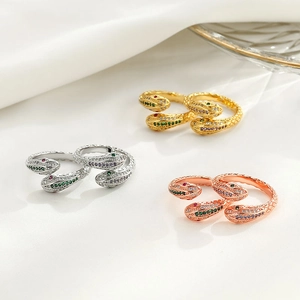 Vintage double-headed snake rings in gold and silver with multi-color zircon stones