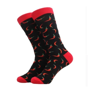 Detailed view of mid-calf socks with red chili patterns and contrasting red toe and heel