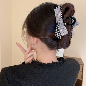 Elegant large hair claw clip with black and white checkerboard rhinestone bow