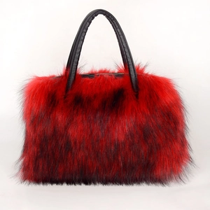 Detail of red and black fluffy faux fur texture with premium black leather handles