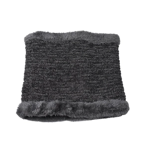 Detail of dark grey knitted neck warmer with thick faux fur trim for winter warmth