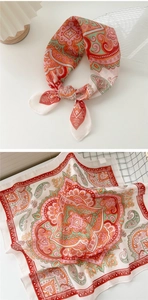 Detail of paisley pattern cotton linen scarf showing tied knot and flat layout visuals
