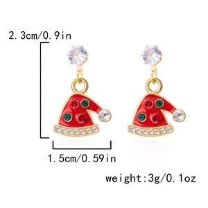 Detail of Christmas hat earrings with red enamel and colorful crystal accents