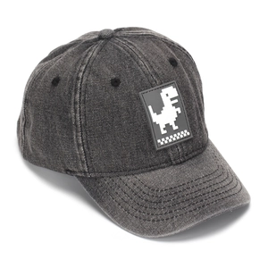 Detail of grey denim baseball cap showing pixel dinosaur patch and breathable eyelets