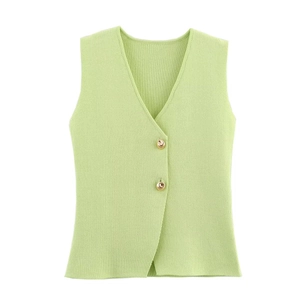 Close-up of light green knit vest featuring V-neckline and decorative gold buttons