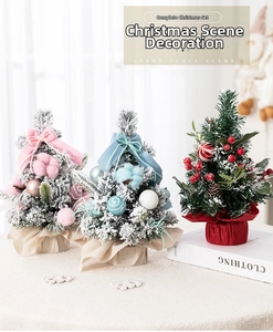 Detailed trio of mini pink, blue, and green flocked tabletop Christmas trees for decor