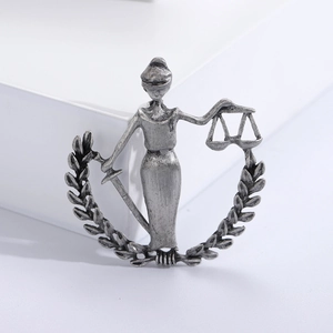 Antique silver Lady Justice brooch featuring laurel wreath and scales for party gift