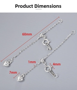 Macro detail of S925 sterling silver adjustable heart extension chain with spring clasp