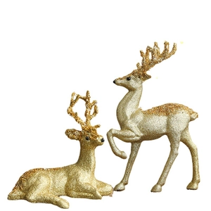 Golden glitter Christmas reindeer ornaments set including a standing and a sitting deer