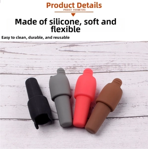 Detailed view of four silicone wine stoppers showing soft, durable texture and handle