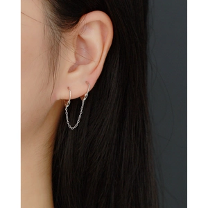 Detail of S925 sterling silver layered chain earrings with interlinked lock design