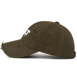 Olive green washed canvas baseball cap with distressed details and white letter embroidery