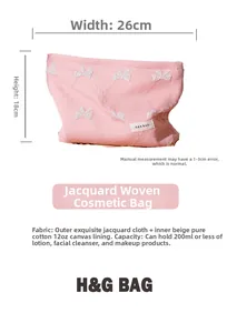 Borsa trucco in jacquard rosa 26x18cm con ricamo a fiocco bianco e interno ampio