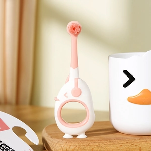 Pink cartoon duck children toothbrush with 0.08mm ultra soft bristles and ring handle