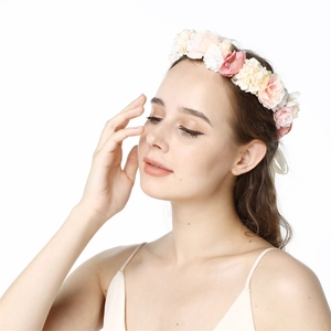 Detail of silk floral wreath headpiece with pink and white flowers for bridal photography