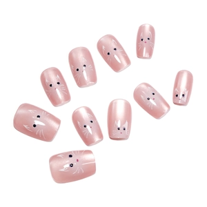 Reusable cat eye short pink press-on nails with cute white cat face patterns