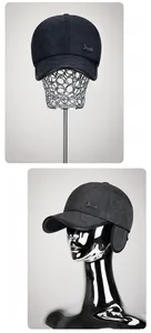 Detail view of winter baseball cap with diamond quilting and protective ear flaps
