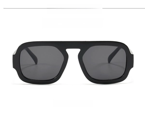 Front view of classic black pilot sunglasses with dark gray lenses and C01 model detail