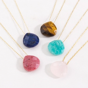 Minimalist gold chain necklaces featuring heart-shaped natural stone pendants in five colors
