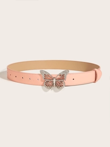 Detail of pink leather belt featuring a crystal butterfly buckle for a sweet stylish look