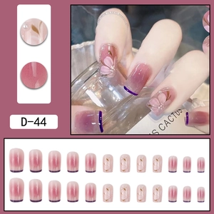 Faux ongles dégradé rose blush avec art floral et bordure française Set D-44